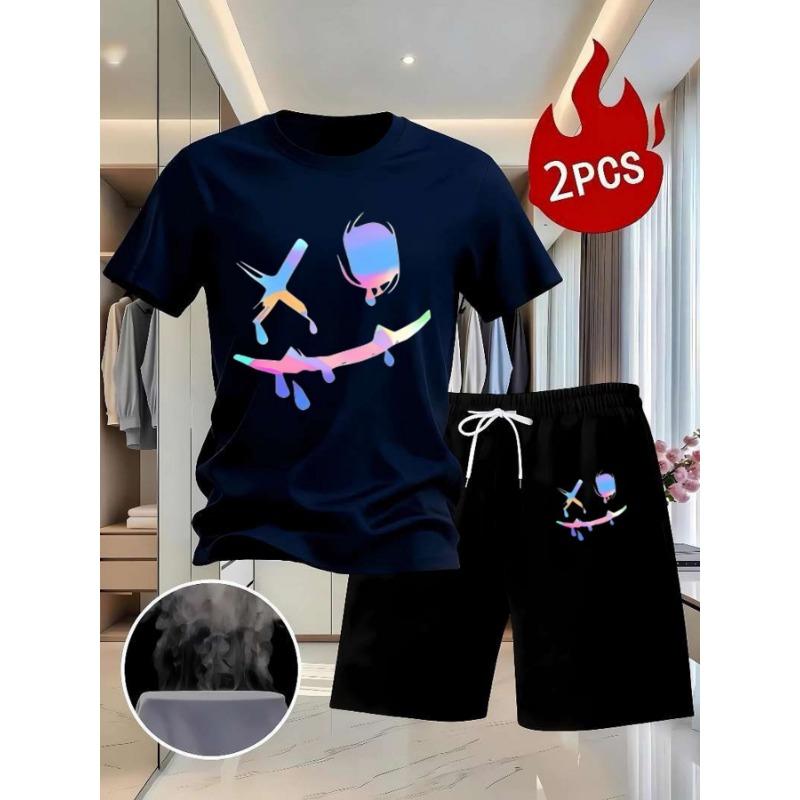 

Set of 2 white T-shirts with colorful abstract design paired with black drawstring shorts XL