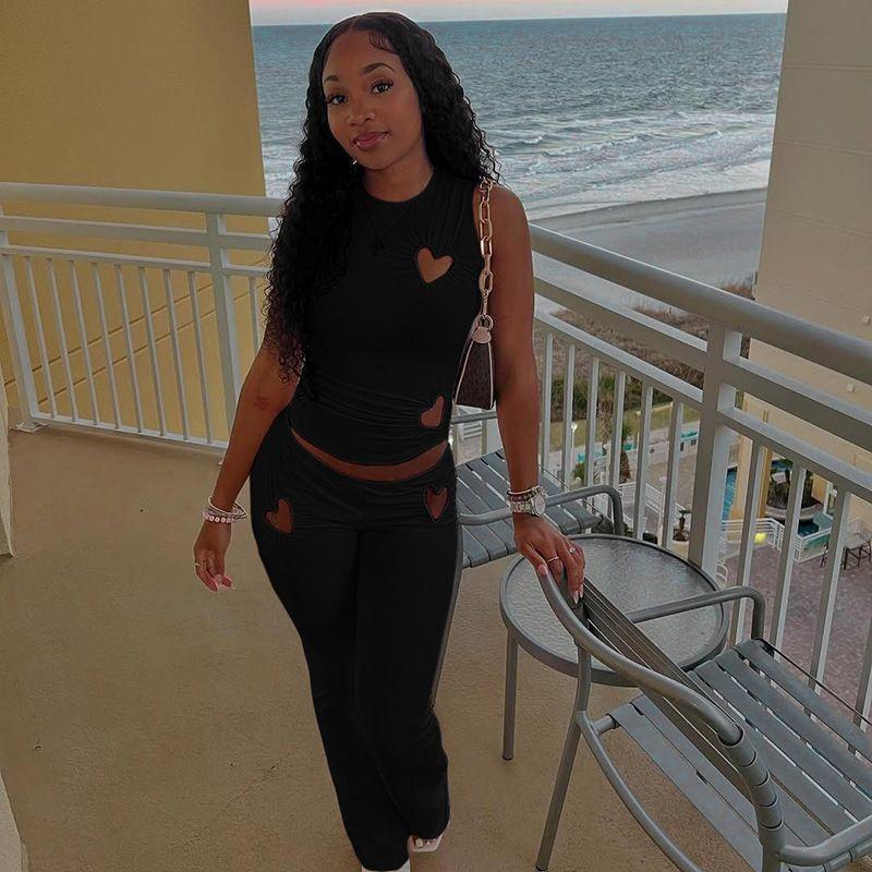 

Cnyishe Fashion Temperament Gyaru Hollow Heart-Shaped round Neck Slim Fit Vest Low Waist Skinny Pants Two-piece Set Black L