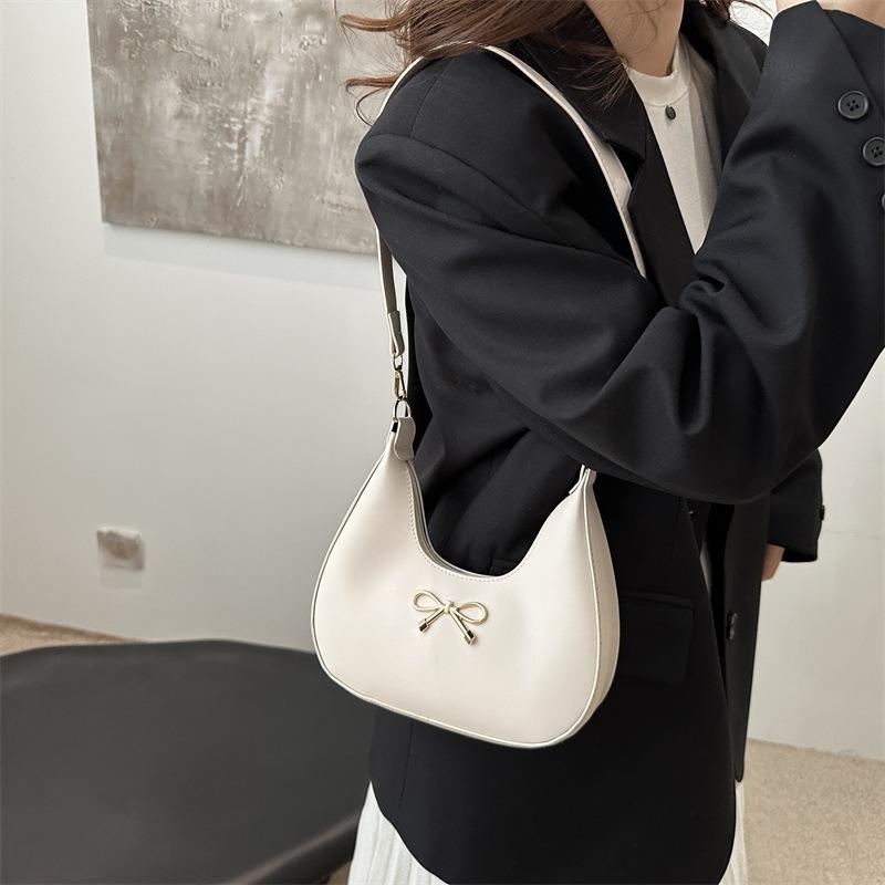 New Temperament Women's Bag Shoulder Bag Bow Decorative Design Crescent Bag Simple Niche Women's Bag