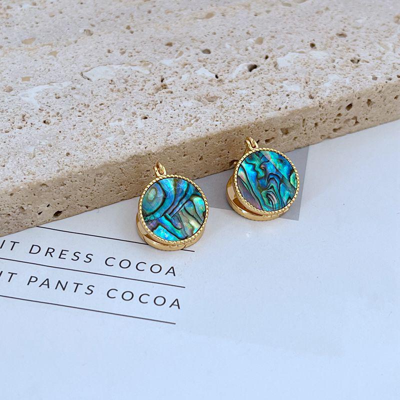 

Французская мода Легкая роскошь Металлические серьги-пусеты в виде ракушек зелёный