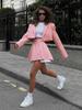 Zweiteiliges Anzugset - Outfit mit kurzem Rock und Blazer