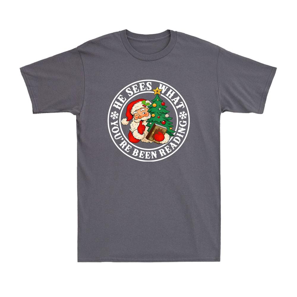 He Sees What Youve Been Reading Bookish Christmas Santa Clause Unisexs TShirt