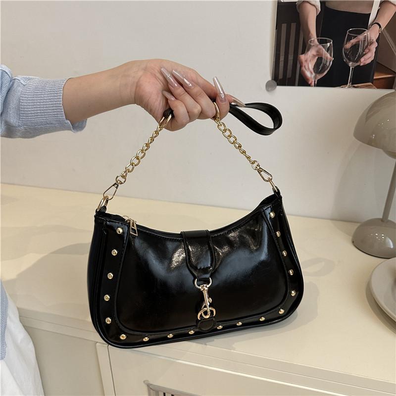 

Autumn and winter new retro simple shoulder bag women s fashion solid color niche design sense advanced messenger bag чорний