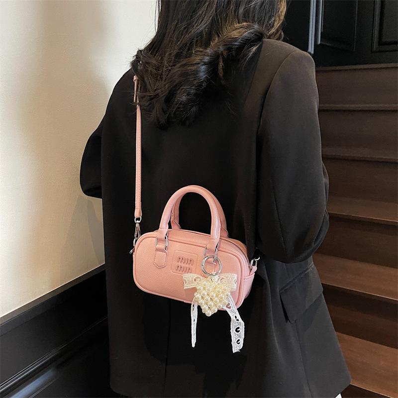 Niche casual messenger bag new fashion shoulder bag feeling hand carry bowling women's bag handbag bag