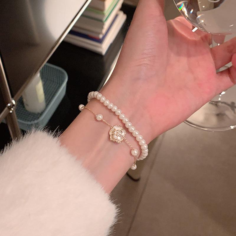 Korean Retro Pearl Titanium Steel Women's Bracelet - High-End Ins Style Beaded Bangle for Couples