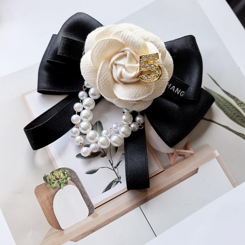 Modern Pearl Floral Pin With Butterfly Knot Design For Adult Formal Wear
