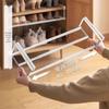 Retractable Shoe Rack Cabinet with Layered Partitions and Under-Hanging Basket for Organized Shoe Storage and Space Saving.