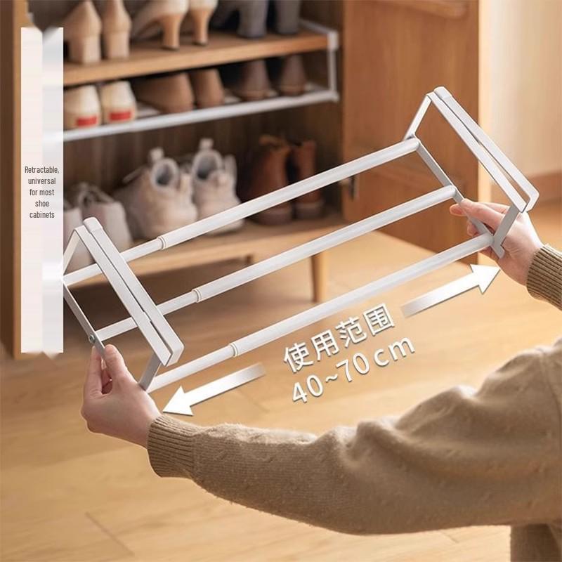 Retractable Shoe Rack Cabinet with Layered Partitions and Under-Hanging Basket for Organized Shoe Storage and Space Saving.