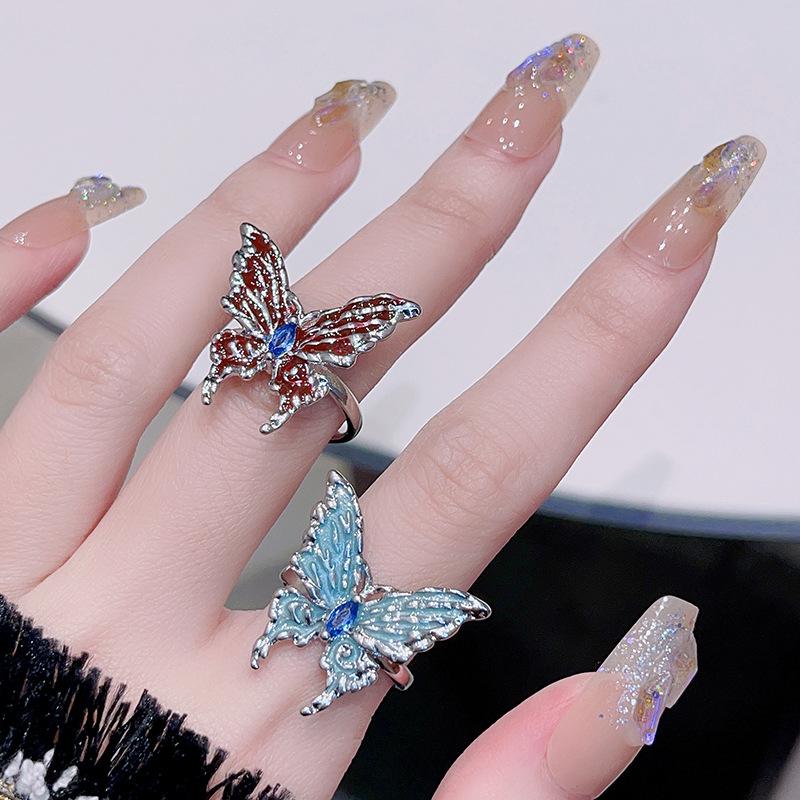 Pierścionek Otwierany z Motylem Trójwymiarowy z Nierównomiernym Kropleniem Oleju Damski Niszowy Design Regulowany Pierścionek na Palec Wskazujący Pierścionek Zimny Wiatr