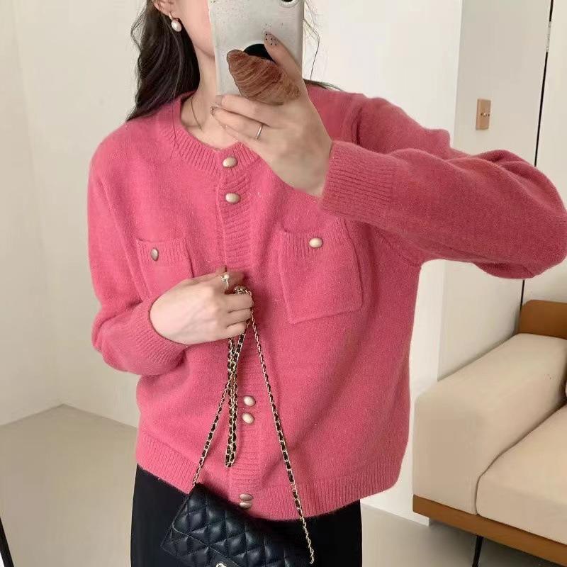 Real autumn and winter new gentle wind double-breasted design sense pocket knitted cardigan women's solid color crew neck sweater jacket