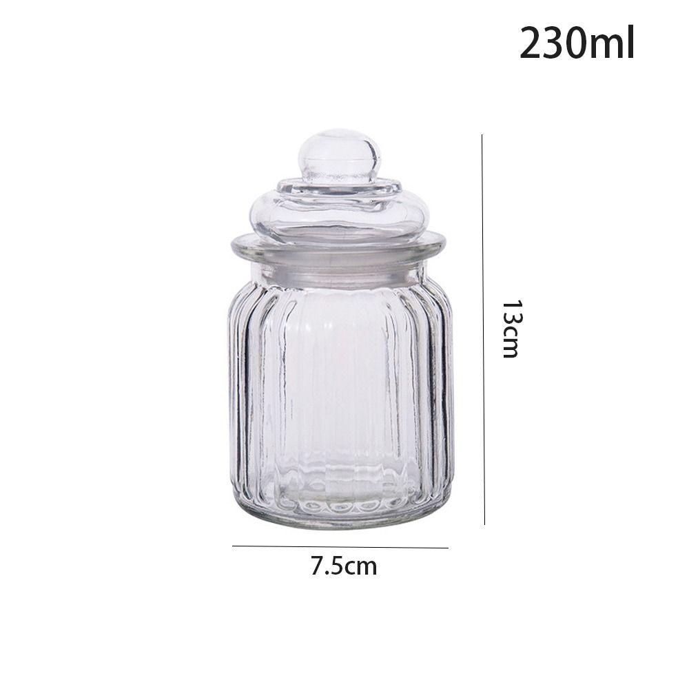 

Вертикальная полосатая стеклянная герметичная банка с крышкой для хранения приправ и чая small