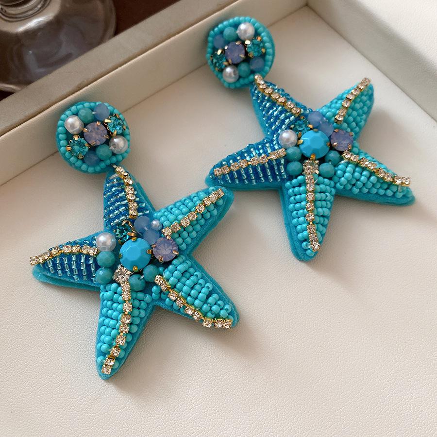 New blue flower fringed earrings, fresh niche design studs, women's summer vacation earrings