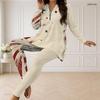 Women Plus Size Beige Star Printed Half Zip Long Sleeve Longline Top And Fitted Pants Two Piece Set