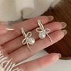 Silver Bow and Pearl Earrings: Elegant, Luxurious, Versatile Women's Accessories