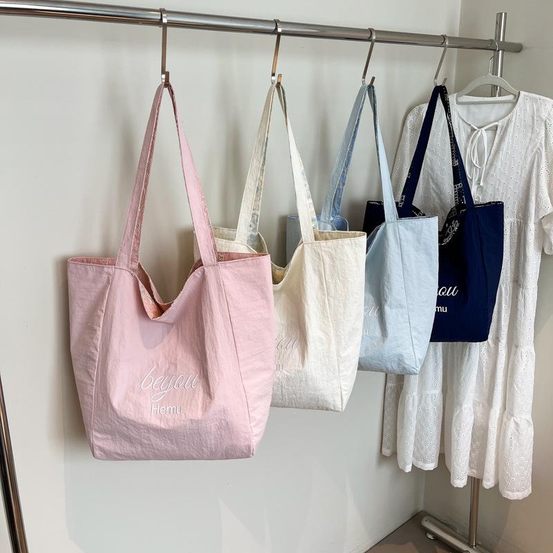 Women's Trendy Korean-Style Embroidered Nylon Tote: Large-Capacity Casual Commuter Shoulder Bag.
