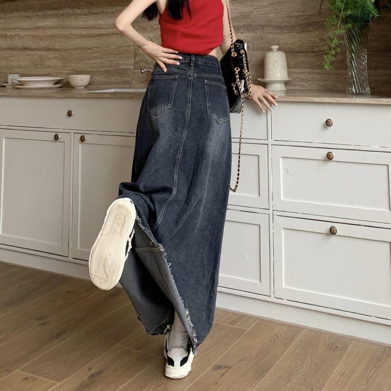 Podzimní a zimní dámská džínová sukně plus size sub medium dlouhá sukně s přezkou a surovým okrajem áčkového střihu