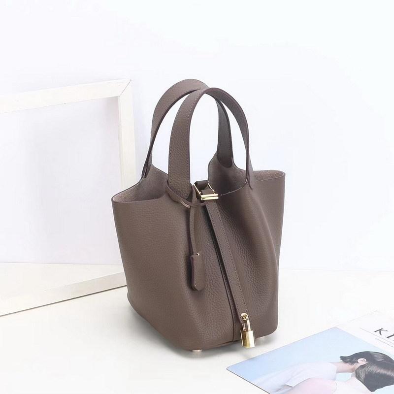 2026 new first-layer lychee pattern leather bucket bag European and American brand fashion gold buckle cowhide vegetable basket women's bag