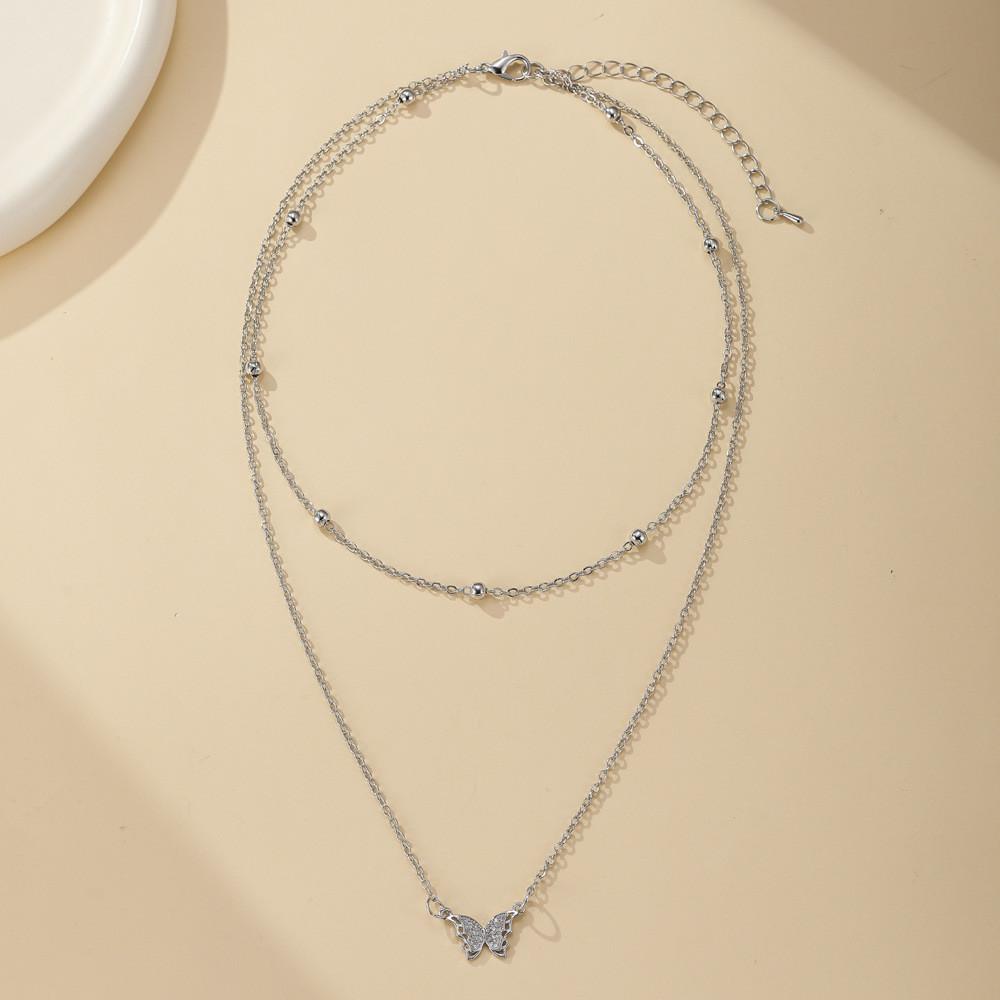 

Elegant Dual Layer Butterfly Necklace For Women With Stunning Rhinestone Details Silver Butterfly Pendant