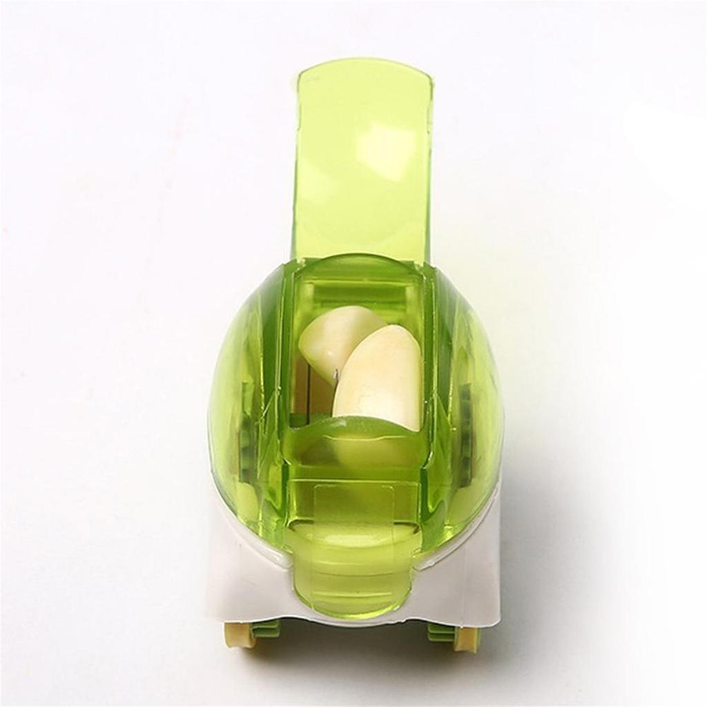 Kitchen gadgets: Garlic chopper, rolling garlic twister