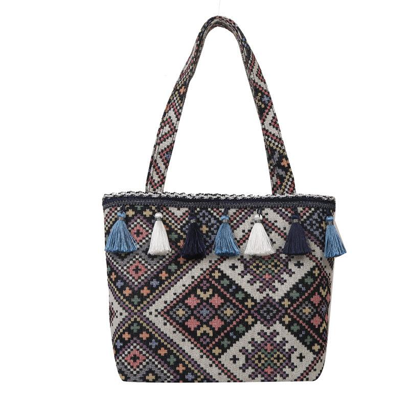 Large-capacity tote bag women's new fashion ethnic style student portable school bag foreign style fringed shoulder women's bag