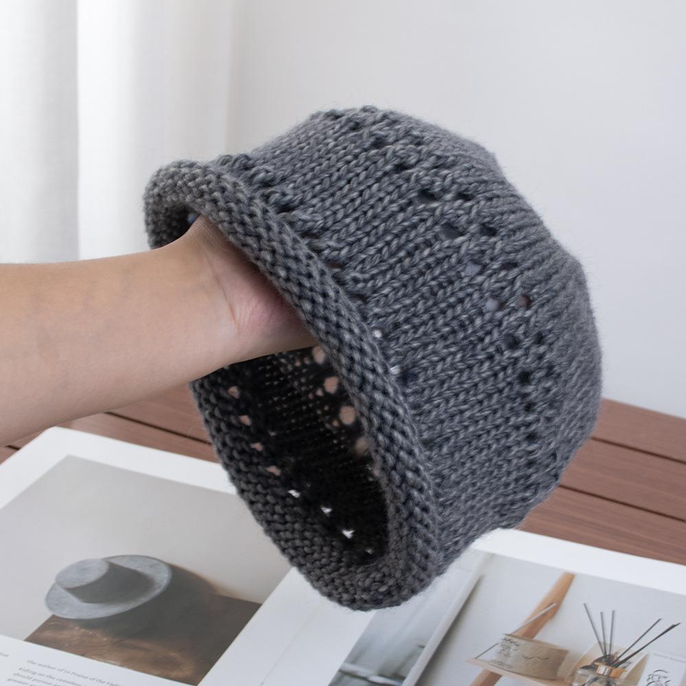Solid color crimped hollow knitted headgear women's autumn new versatile wool hat loose pullover cold hat