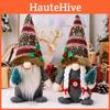 Kreative rustikale amerikanische Weihnachtswichtel-Puppe mit Strickmütze und Baum