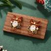 French bow New Year's pearl autumn and winter silver needle burgundy Christmas series earrings niche high-end personalized earrings