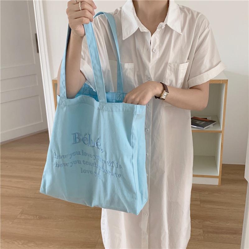 1 Embroidered canvas bag Macaron student shoulder bag