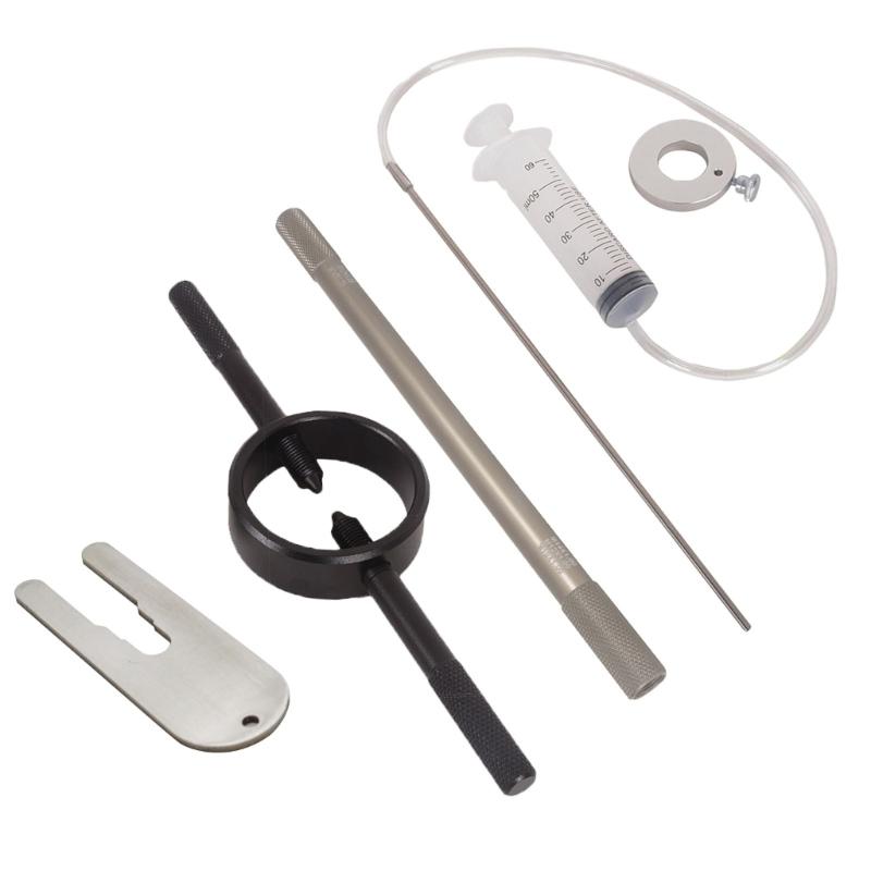 

Comprehensive Professional Adjustable Motorcycle Fork Maintenance Kit Including Oil Level Change Tool&Spring Compressor 1