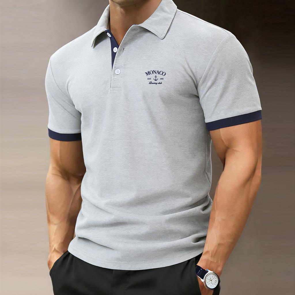 Versatile polo shirt with a 3 button collar and color-blocked cuffs; soft, moisture-wicking fabric; golf-inspired top