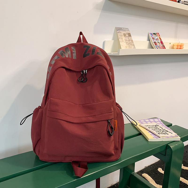 

2025 new college student lightweight Korean lazy style ins schoolbag female junior high school student Mori high-end backpack красный