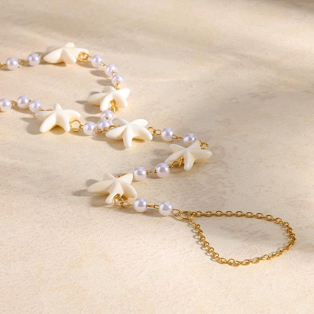 European and American stainless steel back chain starfish vacation wind plated 18K gold imitation pearl jewelry waterproof finger bracelet