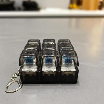 Dziewięć Kluczowych Nakładek na Klawisze Klawiatury Mechanicznej Zabawki Fidget Breloczek Odstresowujący Gadżet na Opuszki Palców Zabawka Fidget Odprężająca