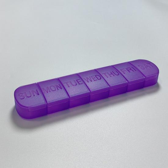 

Compact 7-Grid Pill Storage Case, Sealed Long Strip Design, Large Capacity. 22*5.2*2.3