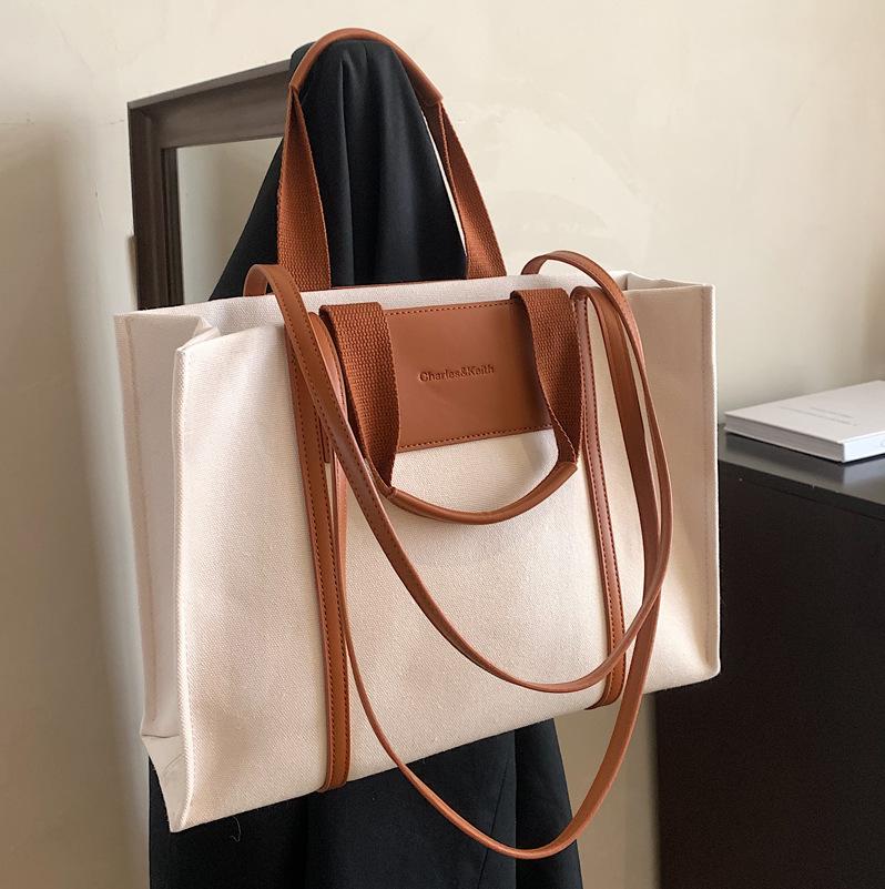 Portable Canvas Large Bag Women's Large Capacity 2025 New High-end Commuting Shoulder Bag Fashion Tote Bag