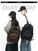 High-End Casual Waterproof Nylon Backpack: Fashionable, Lightweight Travel Bag for Men & Women, with Shoulder Straps & Laptop Compartment.