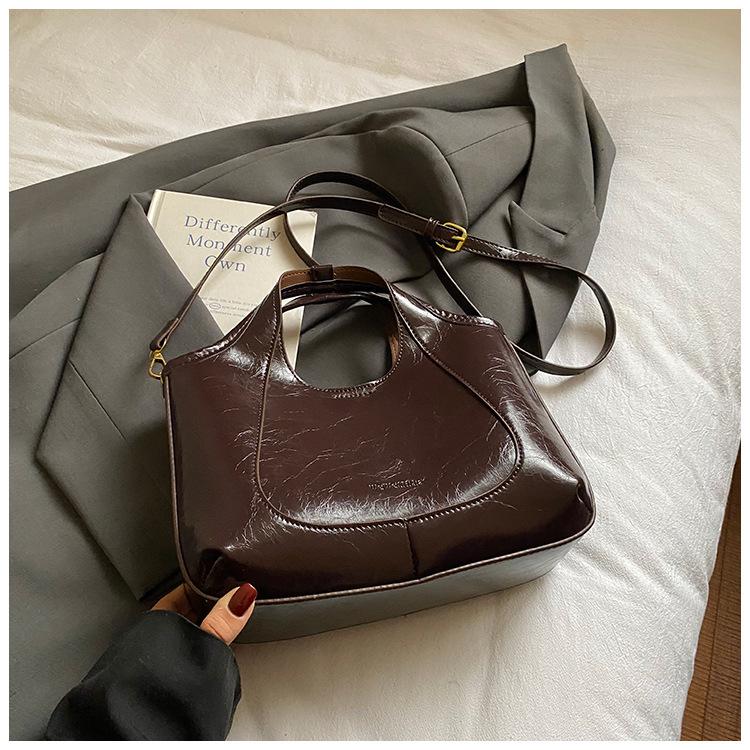 

Premium sense portable small bag women 2025 new retro oil wax leather bucket bag fashion niche shoulder messenger bag