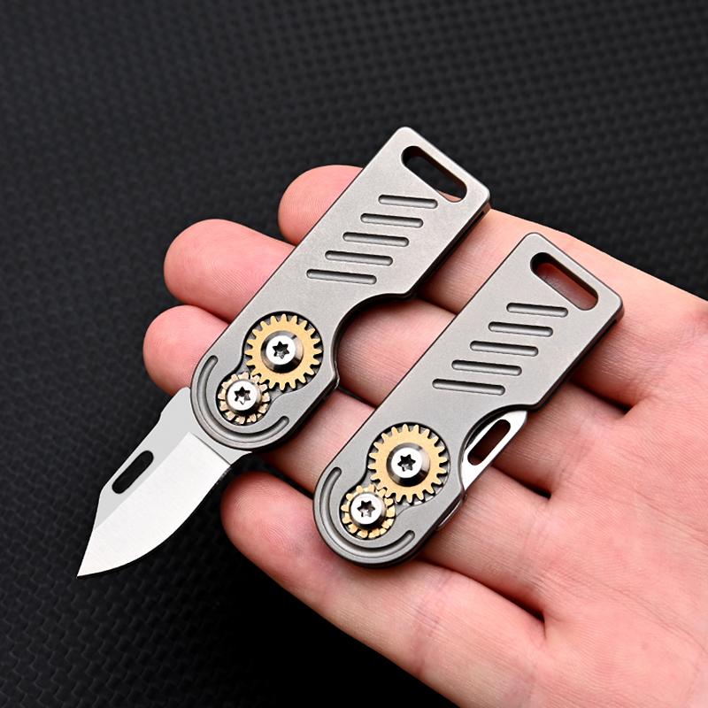 Titanium Alloy Multifunctional Keychain Mini Folding Knife Opening Unpack The Package Tool D2 Steel Portable Hand in Hand Tool