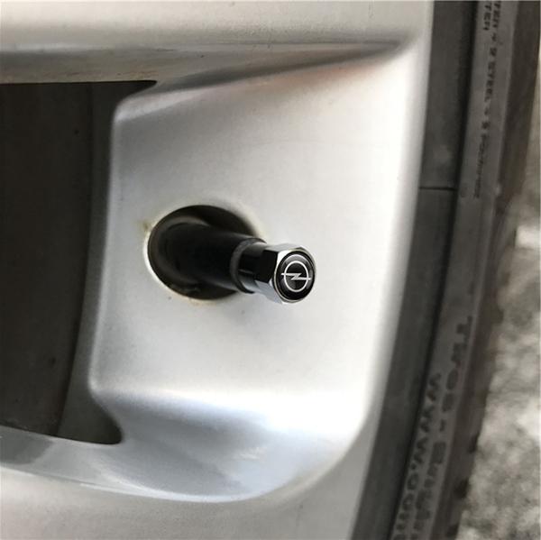 AAHK1 4Pcs Car Styling Metal Tire Valve Stem Caps Rim Accessories For Opel Astra Insignia Mokka Zafira Corsa Vectra C Car Wheel Hubcap