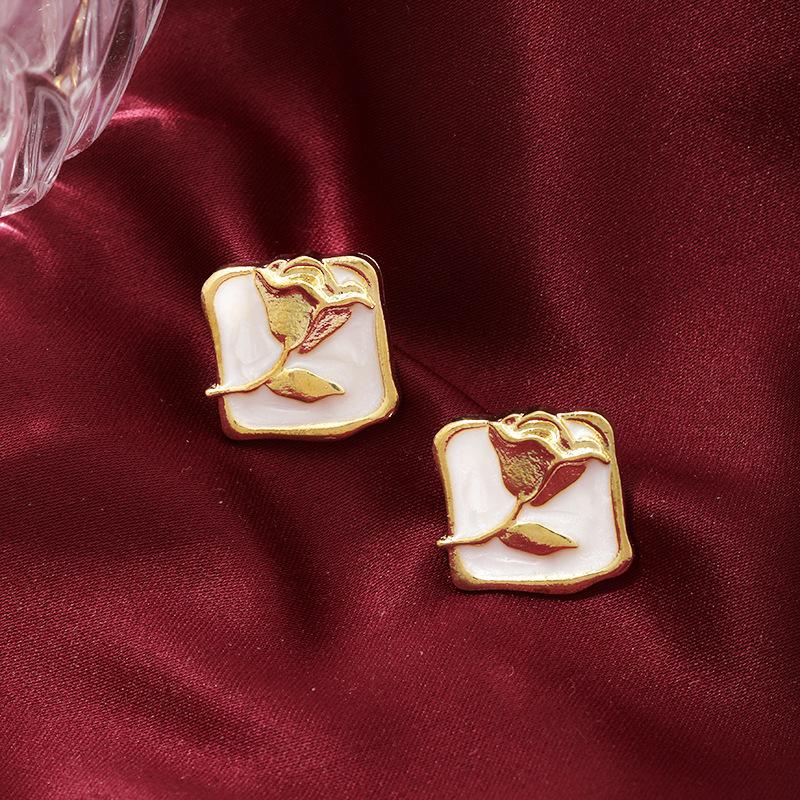French retro rose silver needle earrings autumn and winter new trendy Hong Kong style painting oil rose flowers