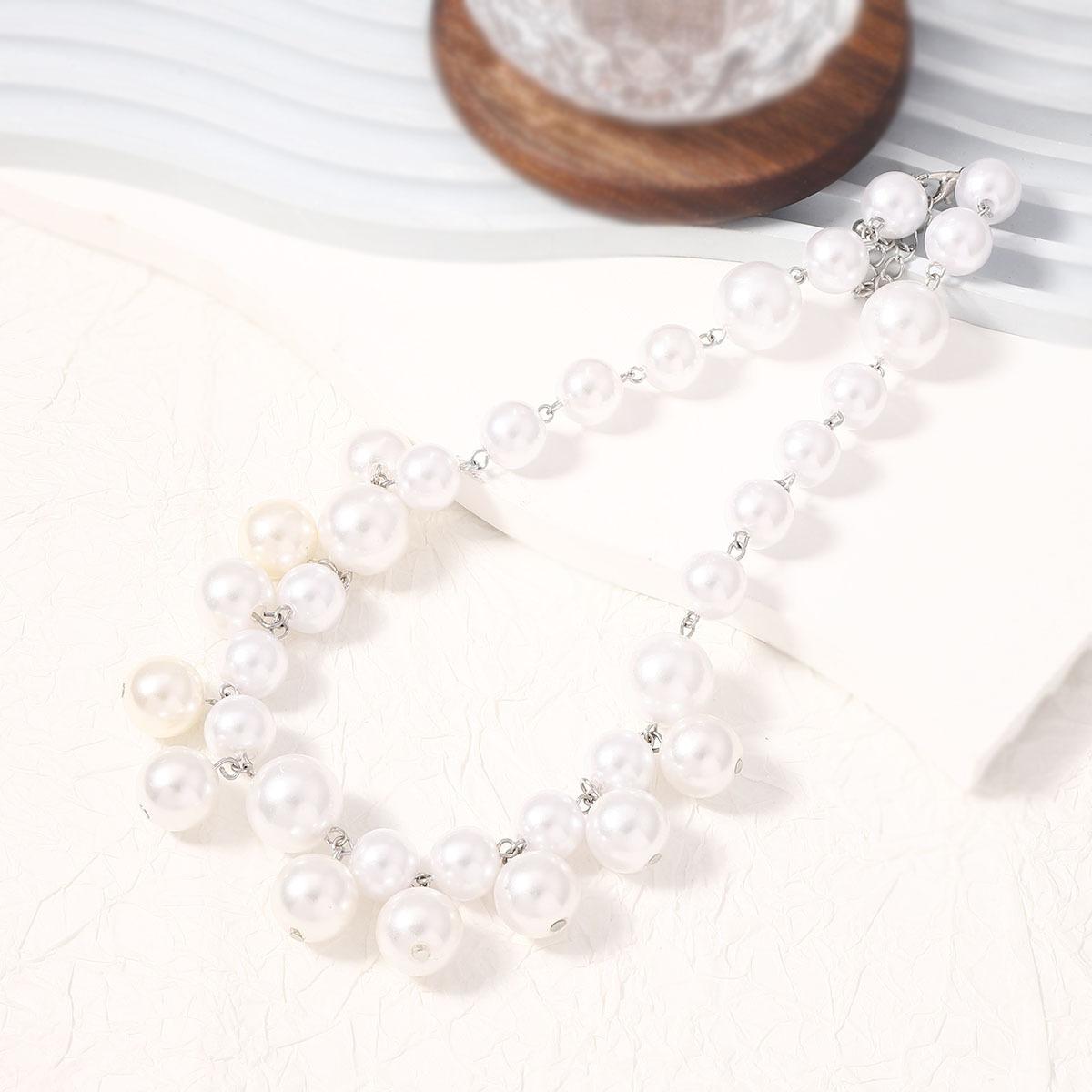 

Fashion OL temperament celebrity style multi-layer imitation pearl hipster must-have necklace creative and versatile design sense білий