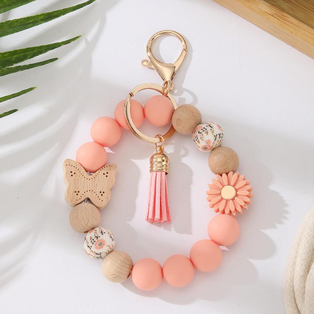 Silicone Beaded Keychain with Daisy, Wooden Butterfly Bracelet & Tassel Pendant