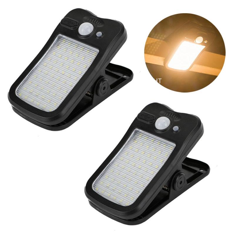 

Світлодіодний сонячний світильник на кліпсі Розумна індукція людини Зовнішнє садове світло Водонепроникна зовнішня лампа для намету, гаража, двору Висока яскравість black shell-warm,2pcs