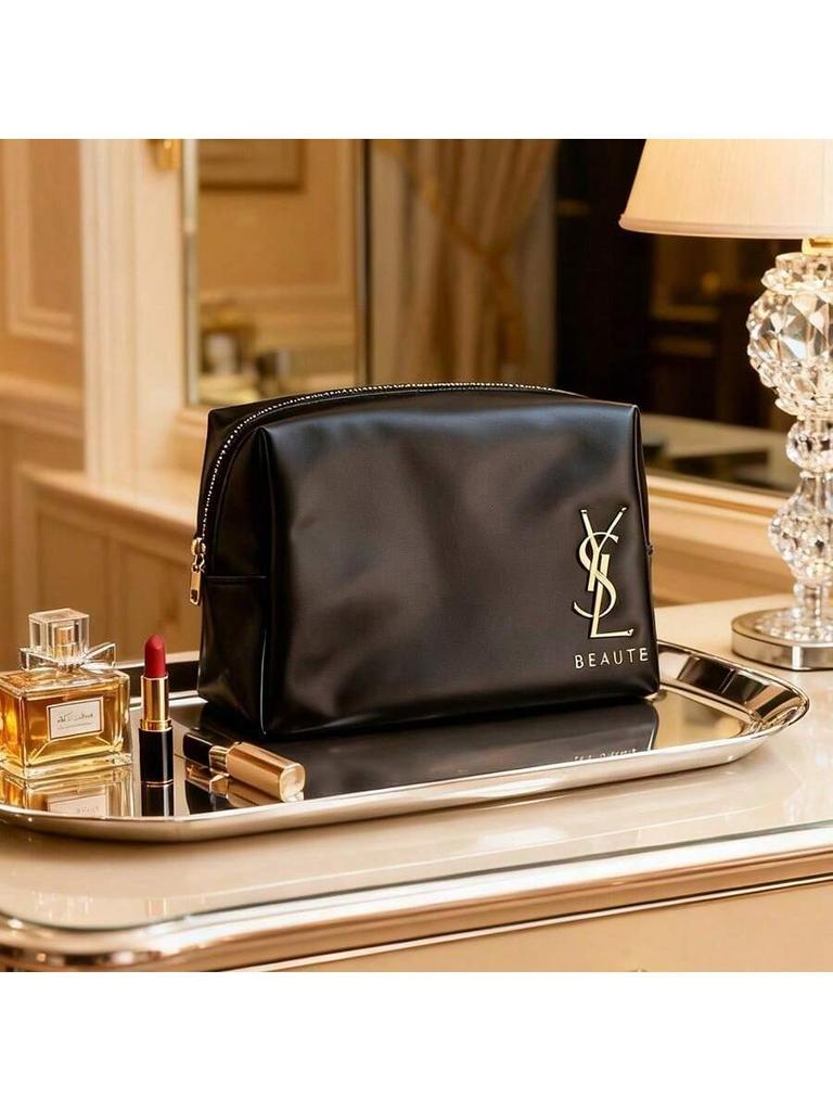 YSL - Black patent leather cosmetic bag with gold logo and zipper closure