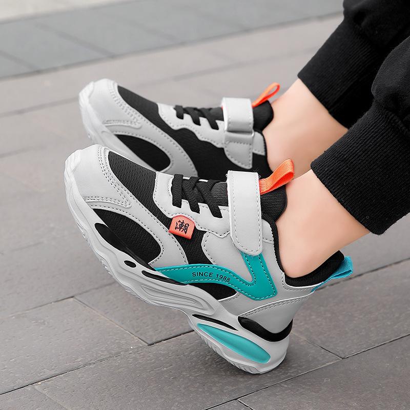 Boys 2025 autumn new student leather waterproof soft sole medium and older girls ultra-light soft sole non-slip sneakers