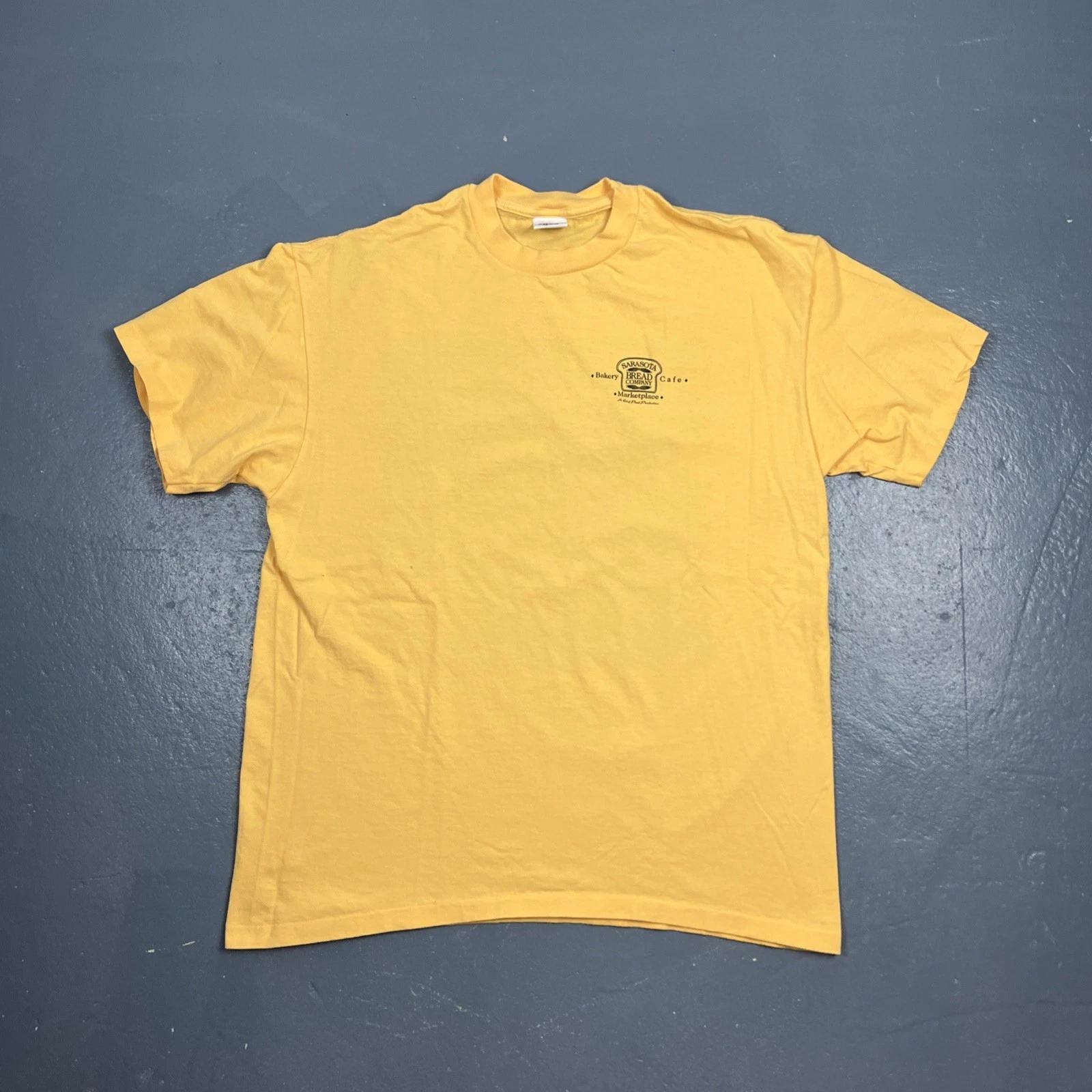 

Vintage 90s Sarasota Bread Company Dbl Sided Tshirt Yellow XL Single Stitch VTG S