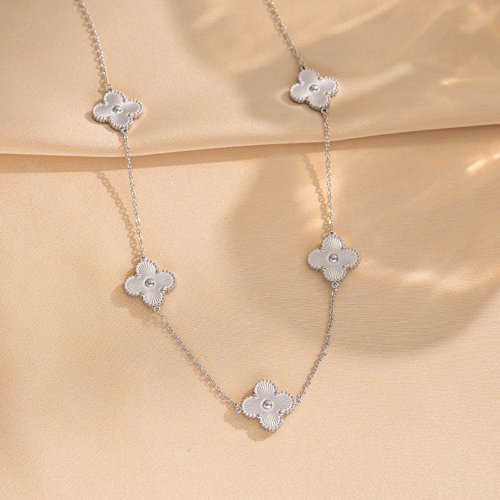 Elegant Four-Leaf Clover Necklace & Bracelet Set - Titanium Steel, Laser-Cut Design, Stylish for European & American Fashion.