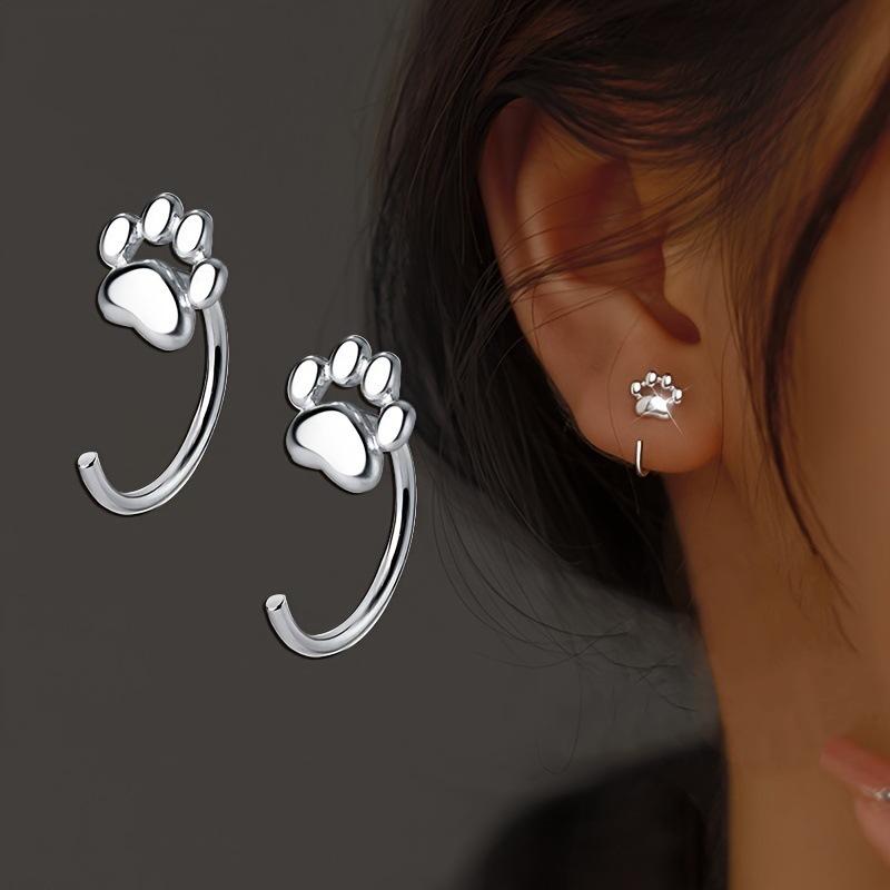 

Foreign trade, simple and advanced sense, double-headed screw buckle silver flash diamond ball, unique S-shaped earrings, earrings