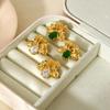European and American retro elegant inlaid emerald zircon flower stud earrings niche plated 11k gold waterproof stainless steel earrings women
