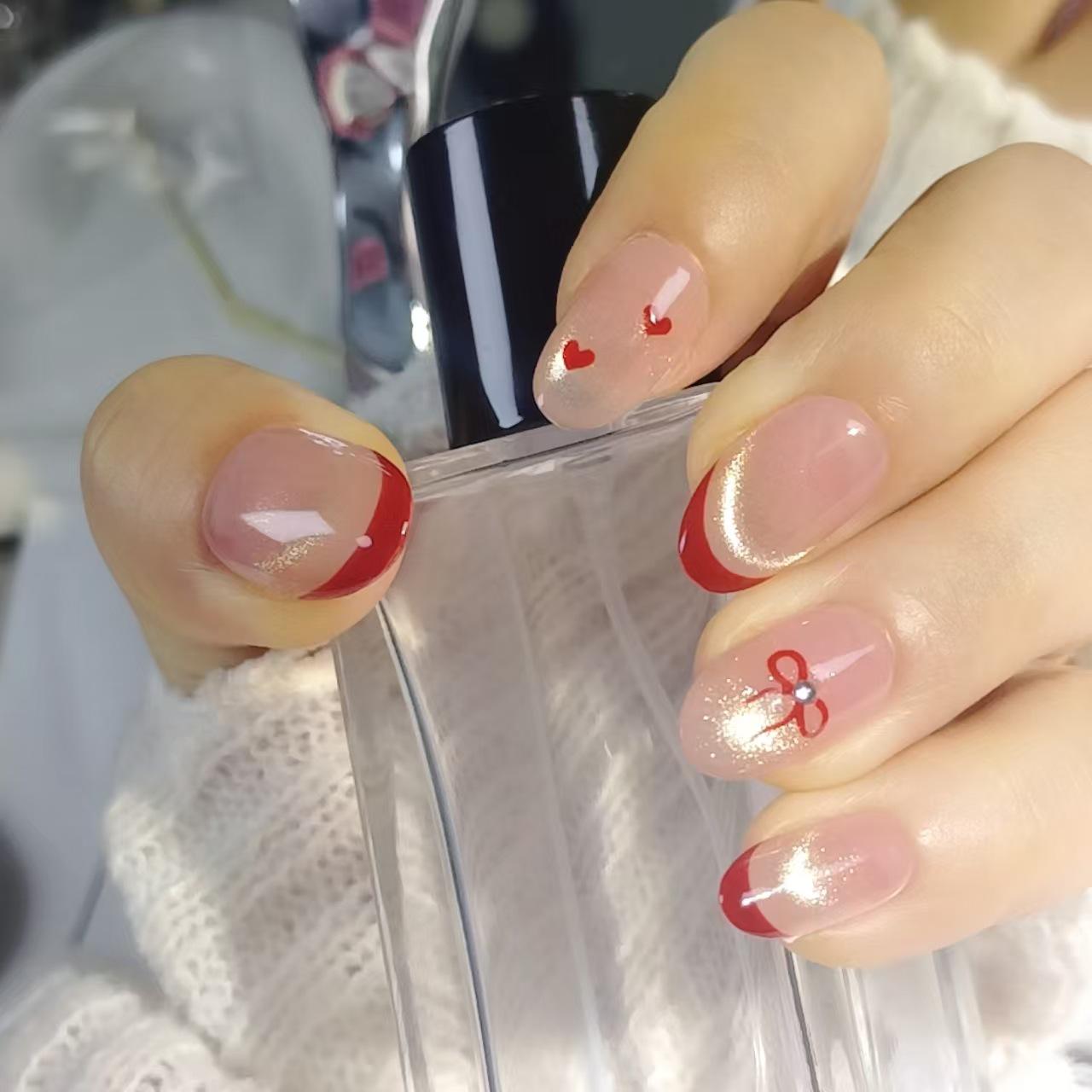 Elegant Red French Heart Cat Eye Nails with Hand-painted Bows Model M